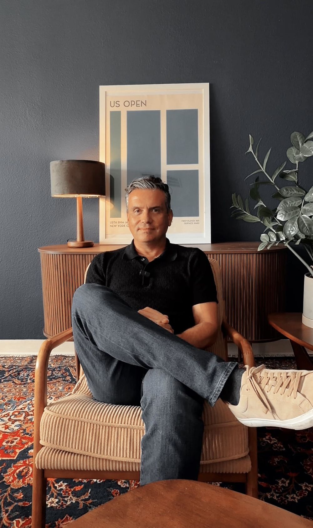 Dave Werth sitting in a chair in his studio